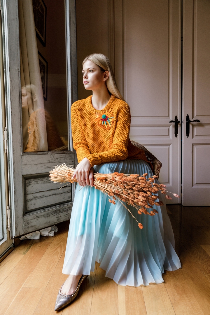 Korsun Orange Cotton Knitted Jumper with Korsun Light blue pleated skirt. 